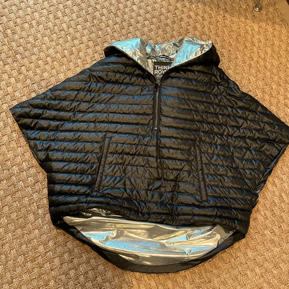 Think Royln black down cape with silver inside. Size xs/small. Very gently worn